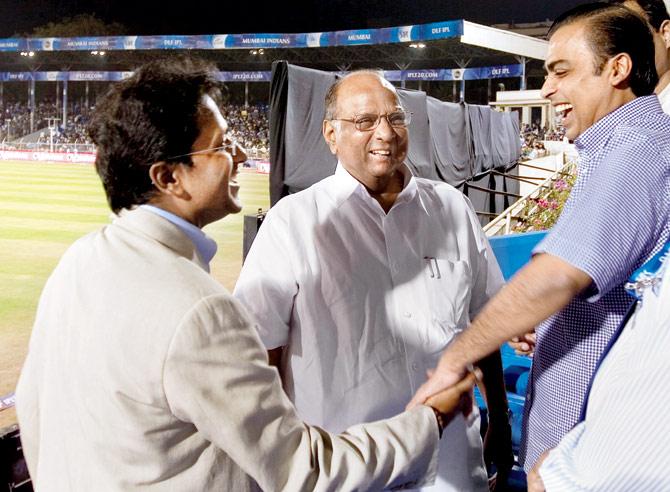 Lalit Modi, Sharad Pawar and Mukesh Ambani share a laugh on during the 2010 DLF Indian Premier League T20 group stage match between Mumbai Indians and Deccan Chargers played at Brabourne Stadium in April