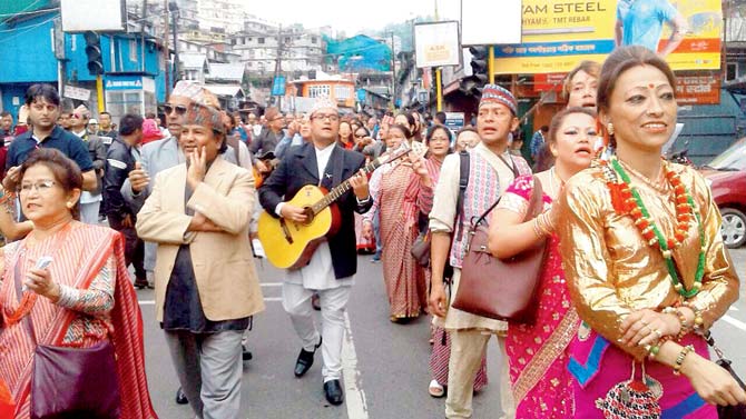 Musicians, artists and film directors take part in a rally in Darjeeling. Pic/PTI
