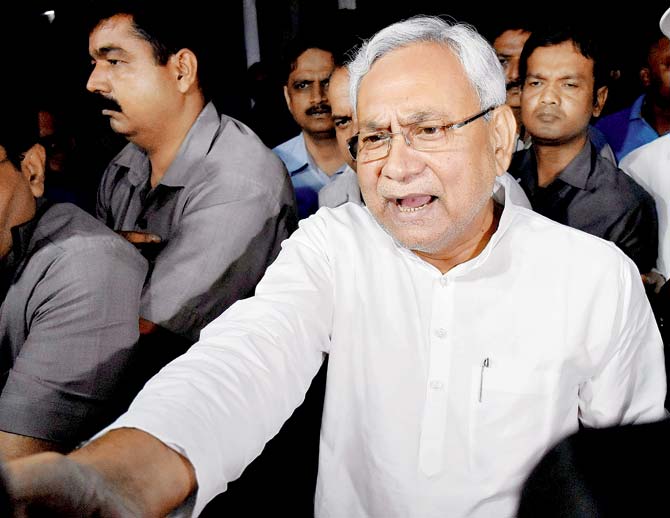Nitish Kumar speaks to the media after meeting Governor KN Tripathi yesterday. Pic/PTI