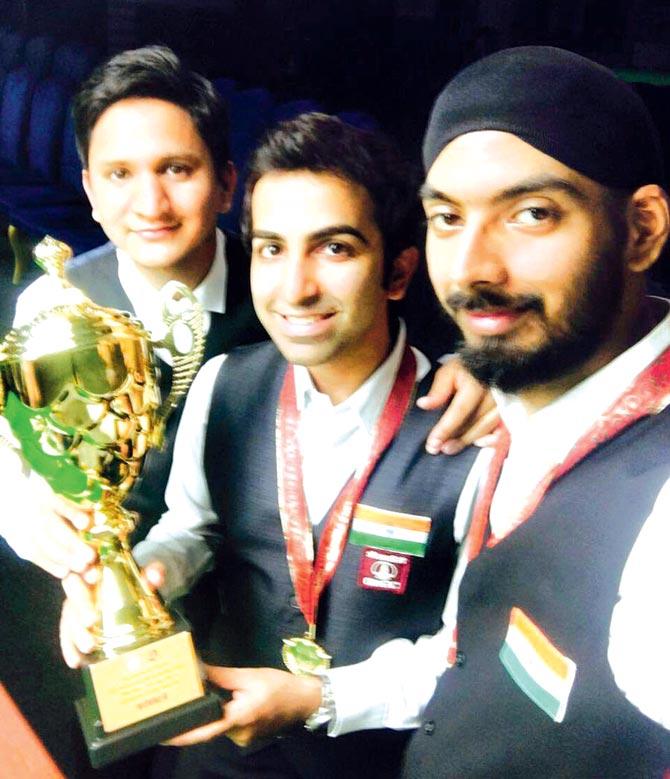 Snooker champs (left) Laxman Rawat, Pankaj Advani and Malkeet Singh (right)