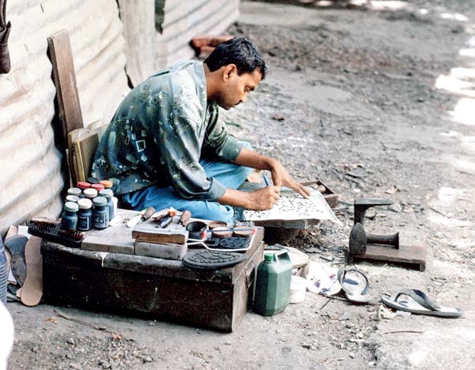 Look closer at Pedder Road: On an afternoon stroll on the street in 1980s, Dehejia spotted a cobbler solving a crossword puzzle and down the road, a man sleeping in a bathtub. Pics courtesy/Harsha Dehejia
