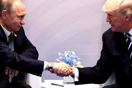 Vladimir Putin tells Donald Trump: Russia didn't meddle in US election