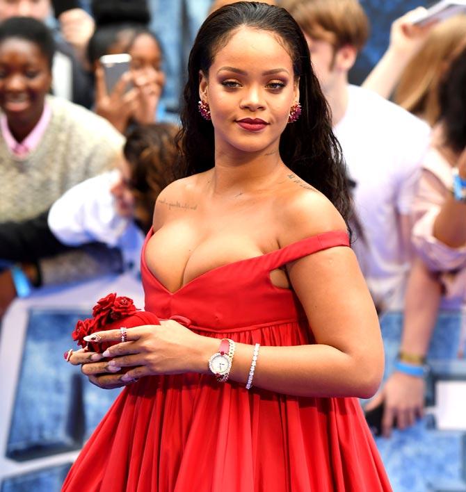 Rihanna poses for a photograph upon arrival for the European premiere of 
