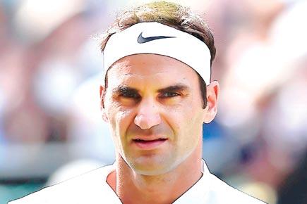 Wimbledon: Roger Federer and Novak Djokovic stroll into Round 2