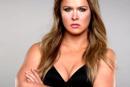 MMA star Ronda Rousey robbed, partner Travis Browne rescues her