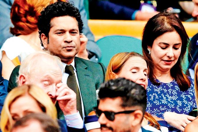 Sachin Tendulkar with wife Anjali at Wimbledon yesterday. Pic/AFP