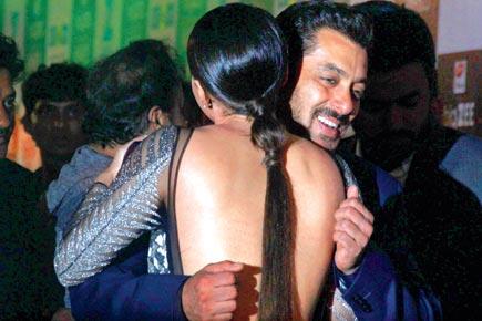 Sana Khan hugs Salman Khan and flaunts her bare back