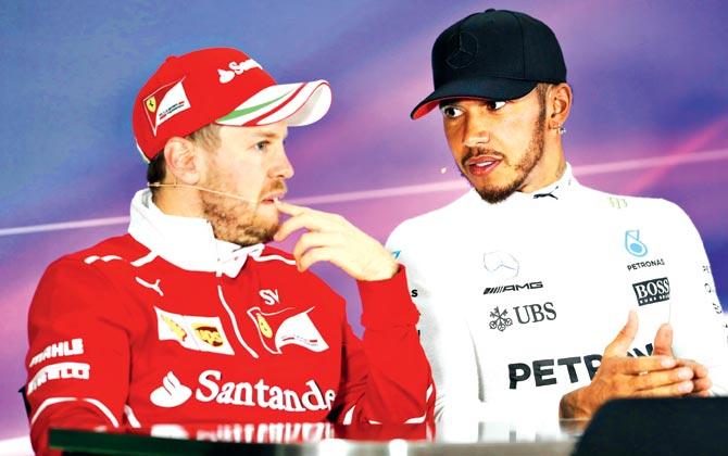 Sebastian Vettel (left) escaped punishment for colliding with Lewis Hamilton at the Azerbaijan GP last month. Pics/AFP, Getty Images