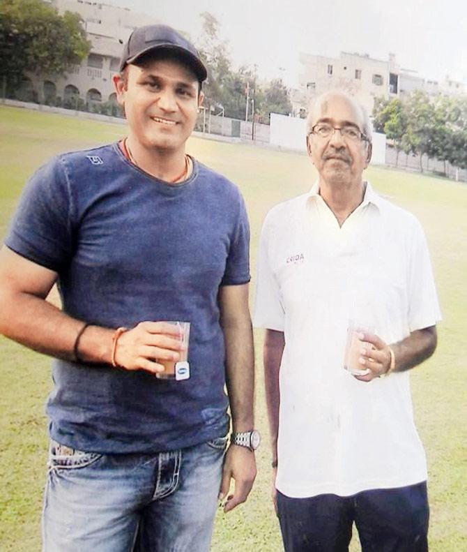 Sehwag and coach AN Sharma