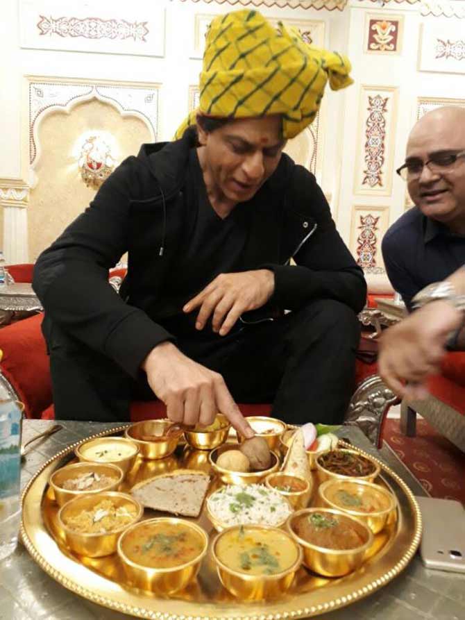 Shah Rukh Khan enjoying Rajasthani delicacies