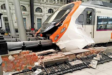 Train slams into platform of busy Barcelona station, injures 54