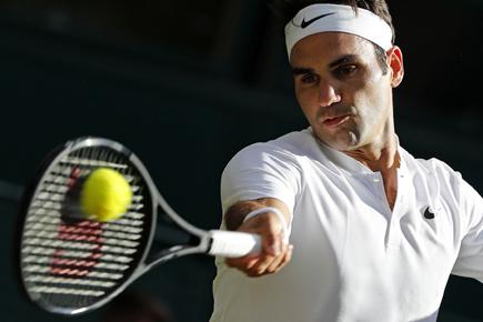 Wimbledon: Roger Federer reaches 50th Grand Slam quarter-final