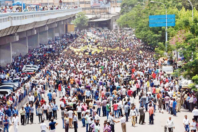Textile traders in a rally to protest against the controversial Goods and Services Tax (GST) in Surat. Pic/PTI