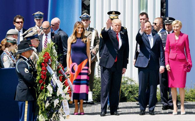 Melania and Donald Trump with Polish President Andrzej and Agata Kornhauser-Duda at a ceremony.