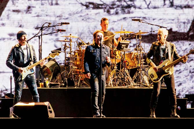 Rock band U2 to pay for Berlin pitch before Liverpool friendly