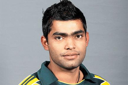 Pakistani cricketer Umar Akmal claims he has been cleared of corruption allegati