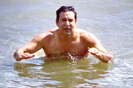 Wasim Akram enjoys a swim off the shores of Bali in Indonesia