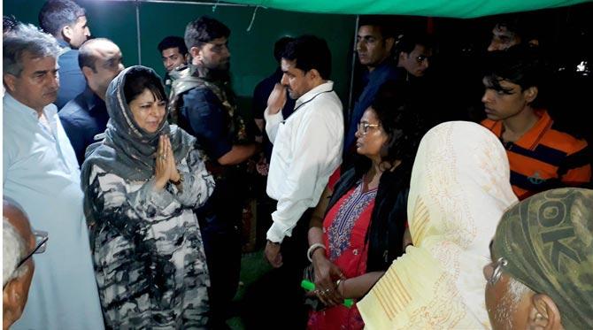 Jammu Kashmir Chief Minister Mehbooba Mufti meeting with the Amarnath pilgrims who survived the Monday