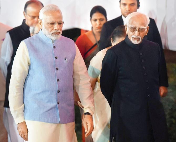 PM Narendra Modi and Vice-President Hamid Ansari before the GST roll-out on Friday. Ansari knows he’s not going to be nominated to a third term by Modi. Pic/PTI