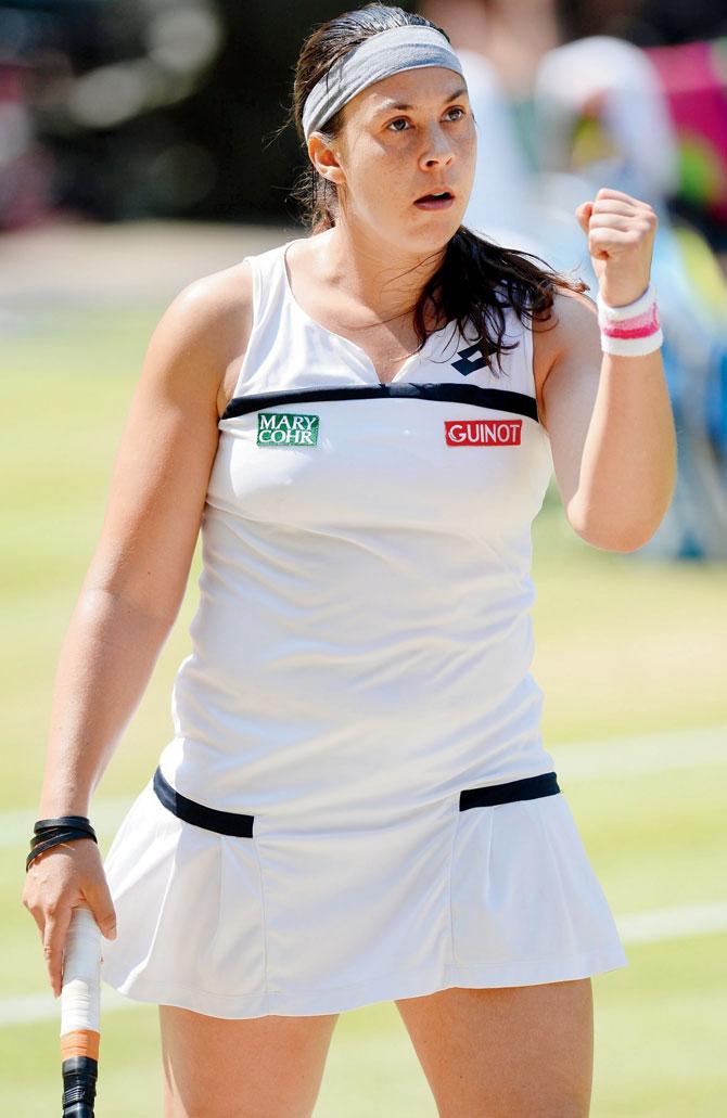 Marion Bartoli at Wimbledon in 2013
