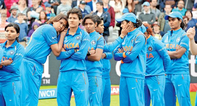 The dejected Indian team after losing the ICC Women