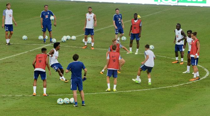 Chelsea football players participate in a training session in Singapore on July 24, 2017