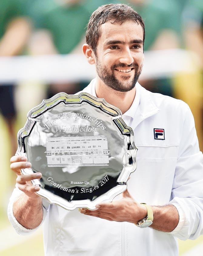 Marin Cilic with their trophies