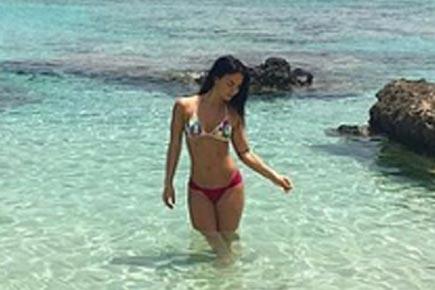 Elli Avrram flaunts her curves in a bikini