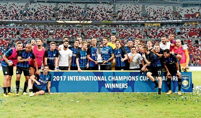 Inter Milan team pose for photographers after defeating Chelsea 2-1 in their International Champions Cup final football match in Singapore on Saturday. Pic/AFP