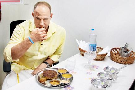 Australian Matthew Hayden enjoys some South-Indian delicacies