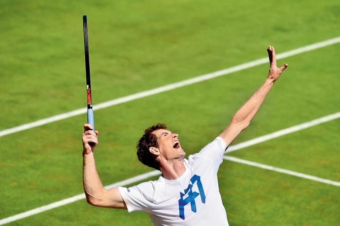 World No. 1 and Wimbledon’s top seed Andy Murray of Great Britain serves during a training session at the All-England Club yesterday. Pic/AFP