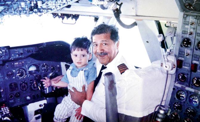 Captain Jag Mohan Nath, 87, the only living Indian Air Force veteran to be decorated with the Maha Vir Chakra twice, seen in the Air India cockpit with his grandson in the late 80s