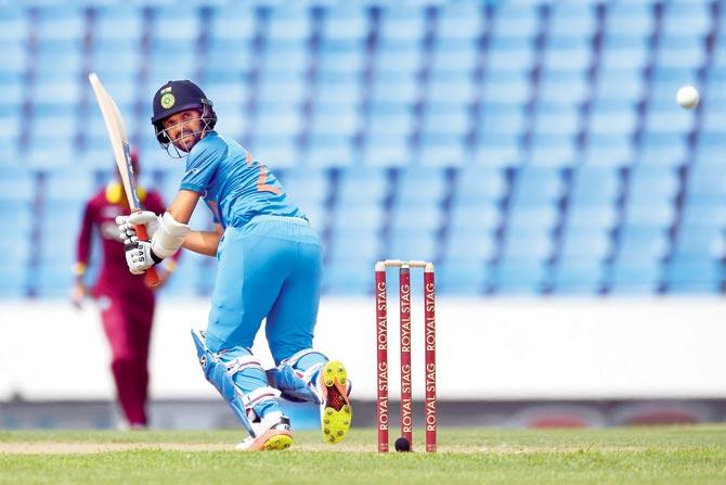 India opener Ajinkya Rahane  en route his 72 against West Indies on Friday. Pic/AFP
