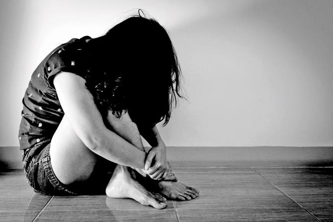 Man held for raping colleague