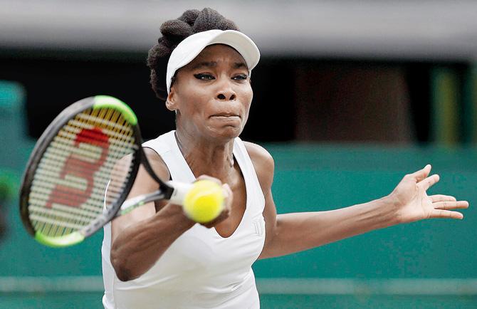 US Venus Williams returns against Croatia’s Ana Konjuh during their fourth round match at Wimbledon in London yesterday. Pic/PTI