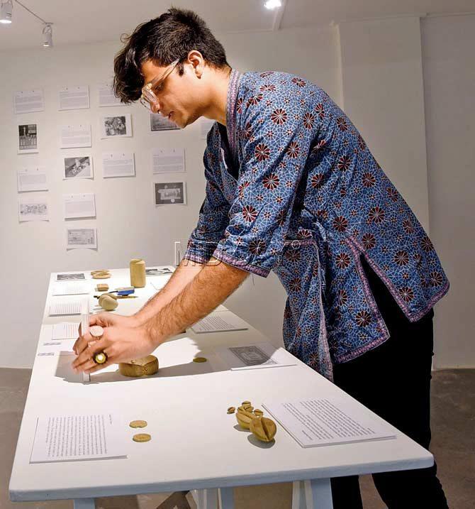 Curator Abhijan Gupta sets up the exhibition at Mumbai Art Room. Pics/Stefanos Tsivopoulos, Prometeo gallery di Ida Pisani, Suresh Karkera