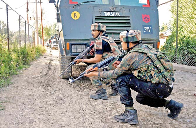 Army jawans during an encounter with terrorists at Arwani village of Anantnag district
