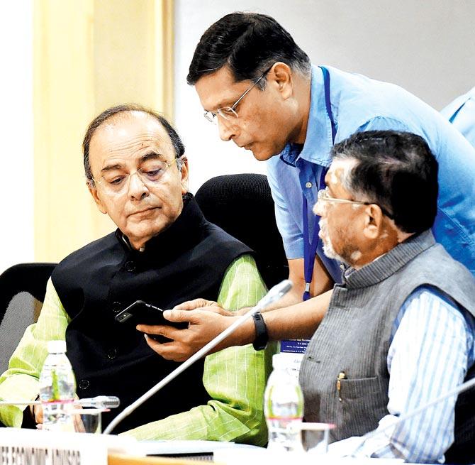 Finance Minister Arun Jaitley at the GST meeting in Delhi. Pic/PTI