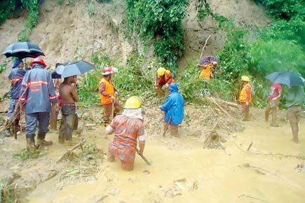 Landslides due to heavy rainfall bury 43 in Bangladesh