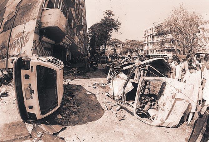 Cars damaged in the blast at the Bombay Stock Exchange on March 12, 1993. The blasts and the riots that preceded them underlined a phase in the city