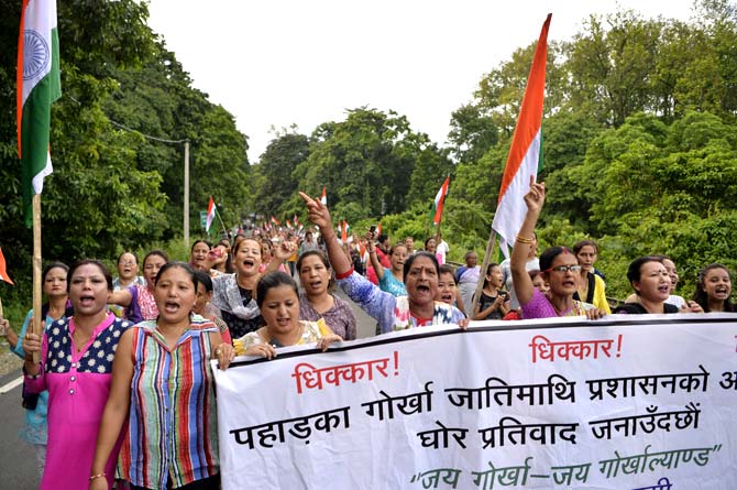 Indian supporters of the Gorkha Janmukti Morcha (GJM) chant slogans during a protest rally in Sukna village on the outskirts of Siliguri. Pic/AFP