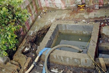 Mumbai: Temple built over drain demolished in Dharavi
