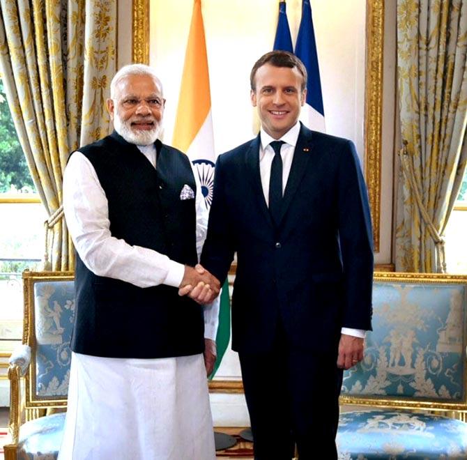 Prime Minister Narendra Modi meeting the President of France, Emmanuel Macron, in Paris. Pic/PTI