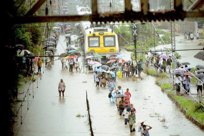 The first round of water logging on railway tracks occurred at Thane and Kalwa (above) stations, where water rose four feet above the tracks, as there was no place for it to drain out. PIC/Sneha Kharabe