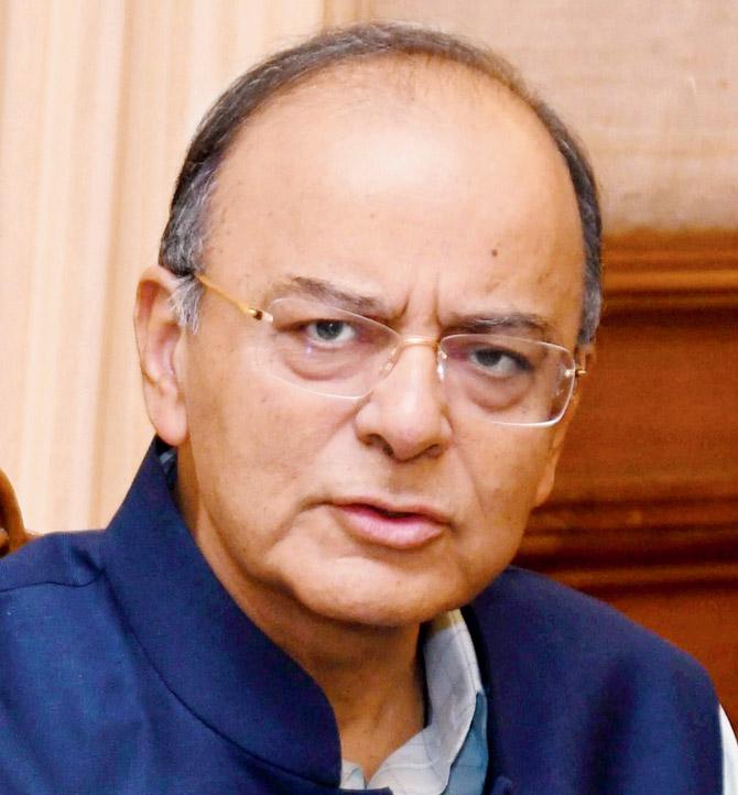 Arun Jaitley said GST over  medium to long term will lead to higher revenues to the Centre and states. Pic/PTI
