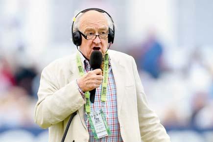 Cricket commentator Henry Blofeld hangs up his microphone
