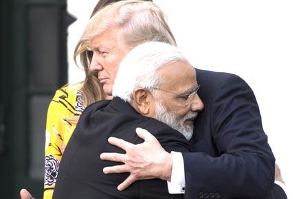 With hugs and praise, Narendra Modi and Donald Trump strike rapport