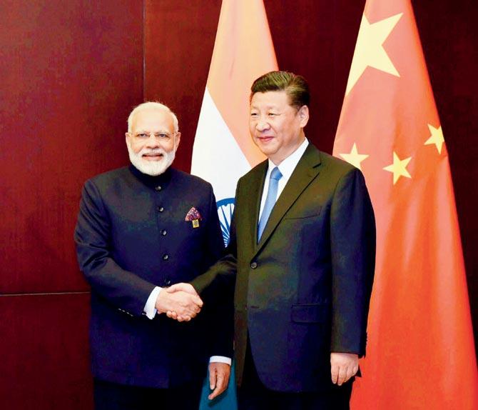 Prime Minister Narendra Modi and Chinese President Xi Jinping at the SCOâu00c2u0080u00c2u0088Summit. Pic/PTI