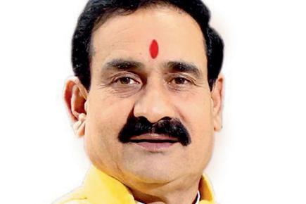 MP minister Narottam Mishra disqualified over paid news charges