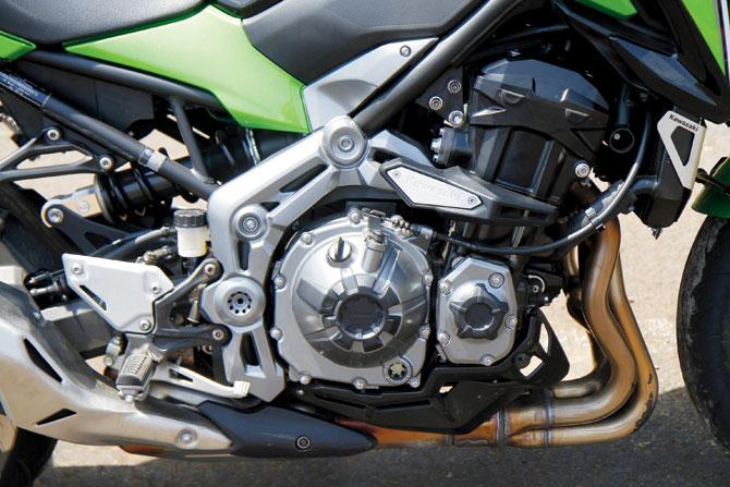 The aggressive 948-cc transverse- four comes with robust crankcase sliders as standard
